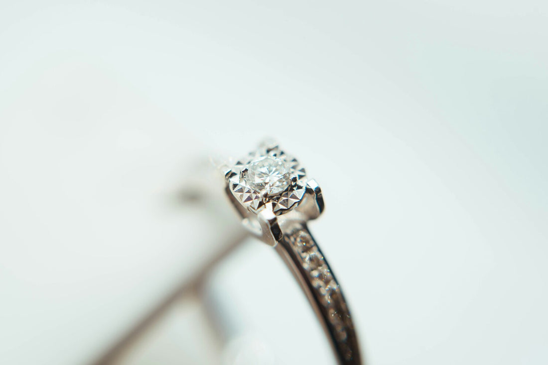 Close-up of a sparkling moissanite ring, showcasing its brilliant cut and clarity.