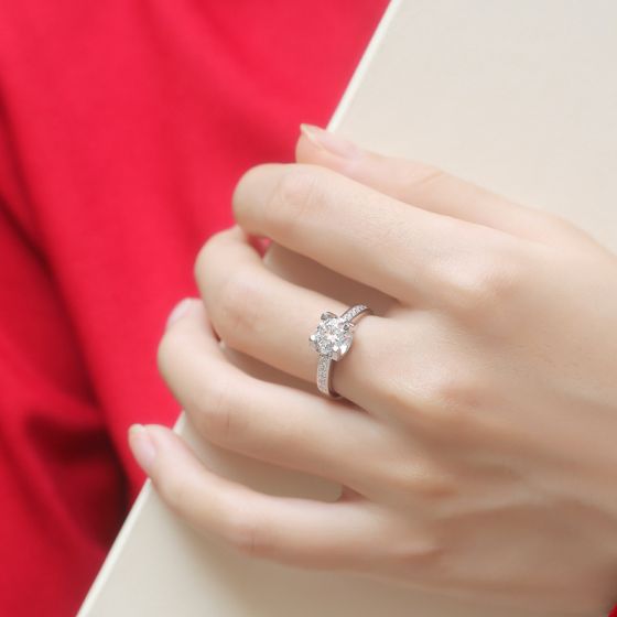 woman wearing eternal goddess moissanite ring